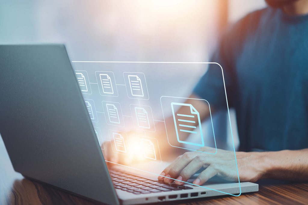 person accessing secure files from a laptop